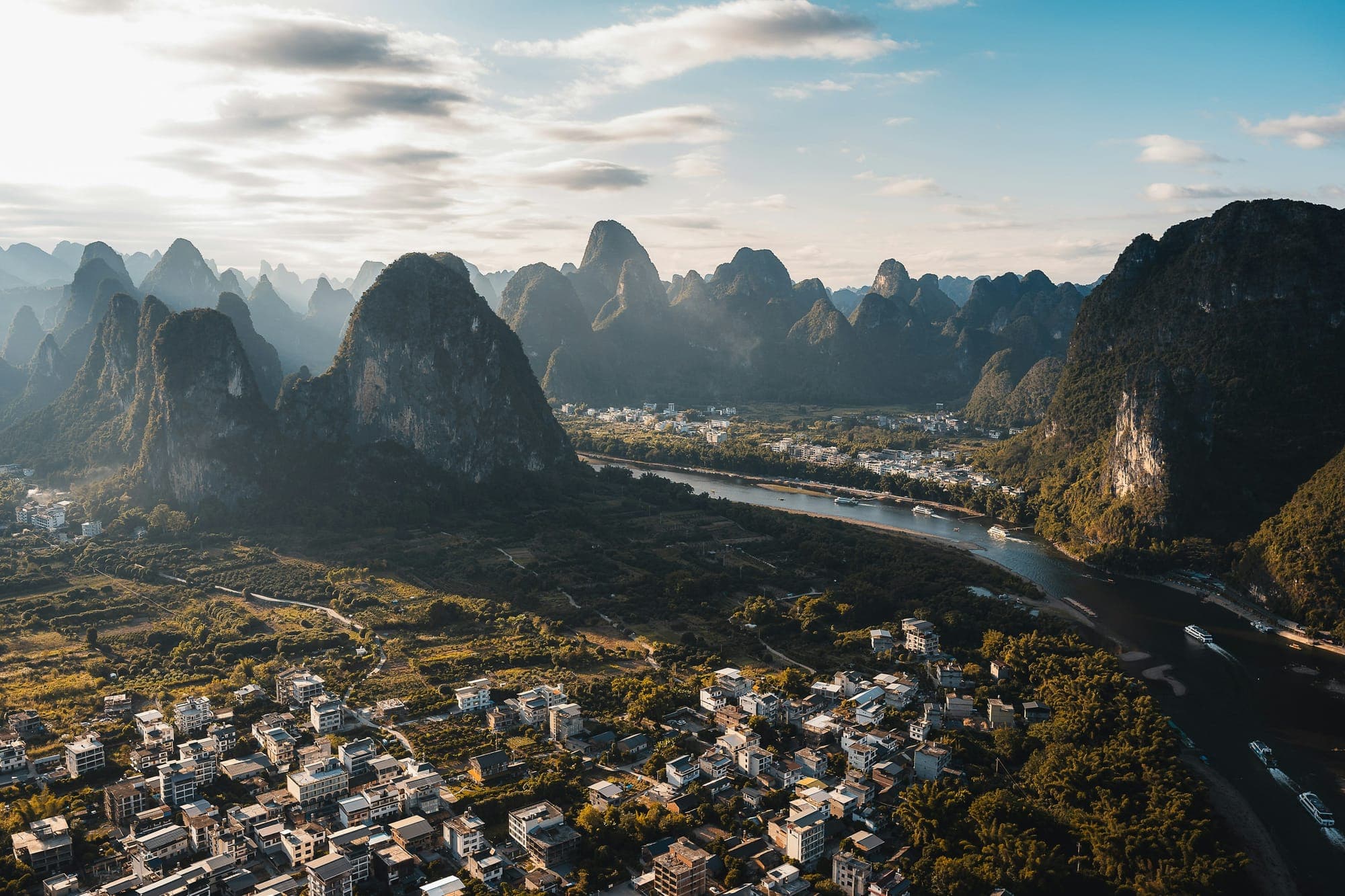 Karst peaks and a river bend near Yangshuo, Guilin, at sunrise