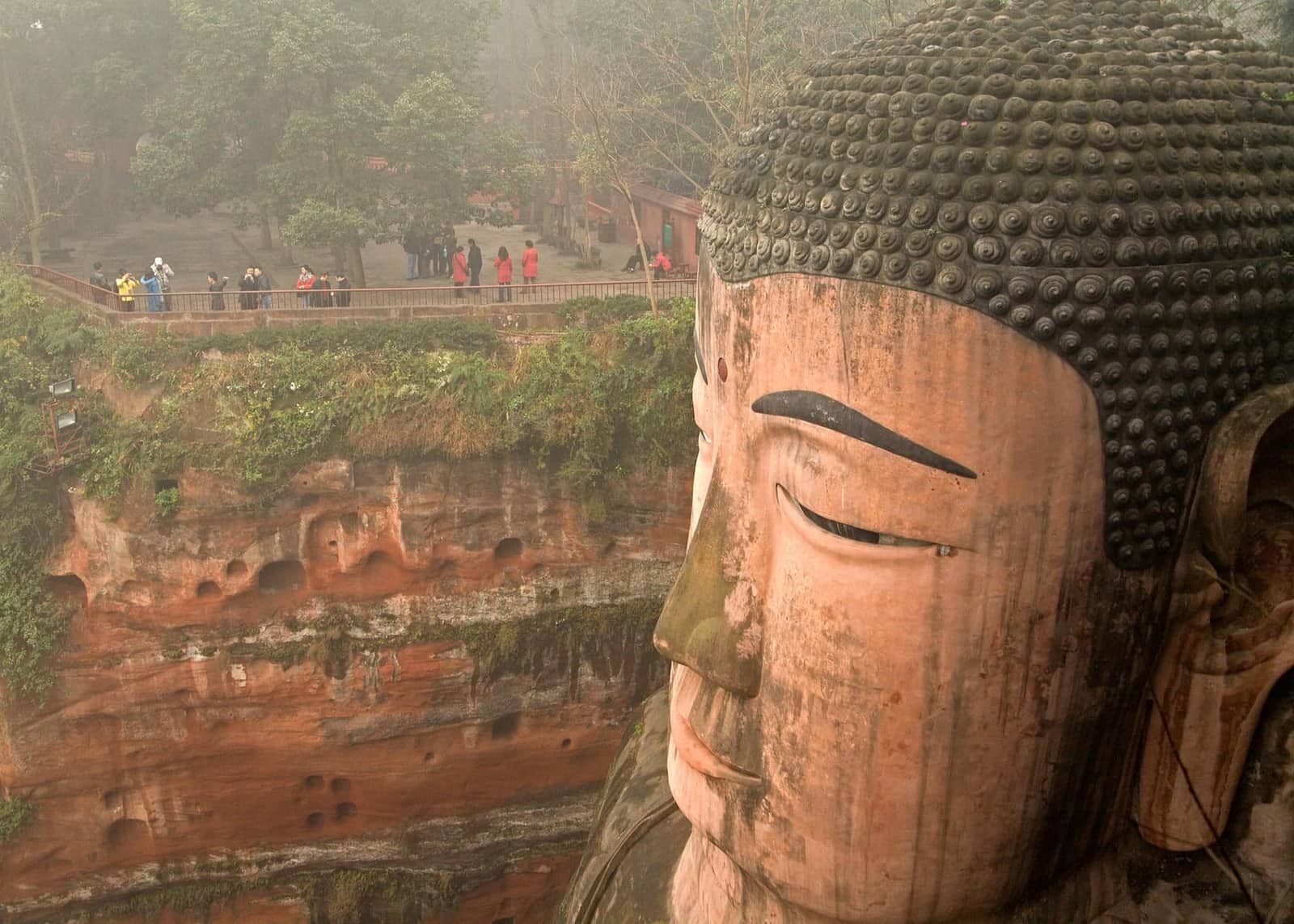 The Leshan Giant Buddha carved into the riverside cliff